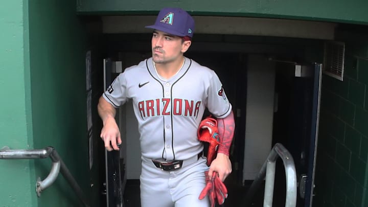 Jul 25, 2025; Pittsburgh, Pennsylvania, USA;  Arizona Diamondbacks right fielder Corbin Carroll (7) enters the dugout to play the Pittsburgh Pirates at PNC Park. Mandatory Credit: Charles LeClaire-Imagn Images