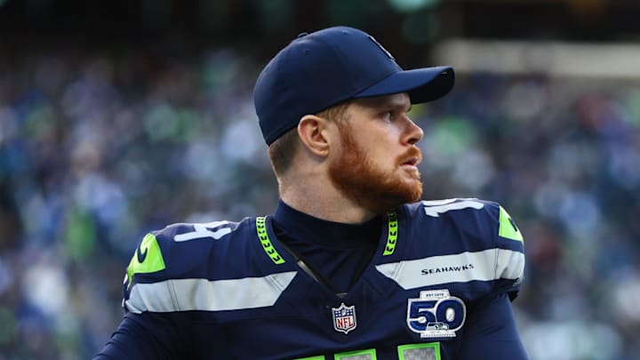 Jan 25, 2026; Seattle, WA, USA; Seattle Seahawks quarterback Sam Darnold (14) passes against the Los Angeles Rams during the first half in the 2026 NFC Championship Game at Lumen Field. 