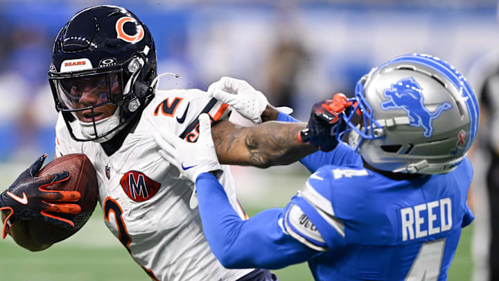 Chicago Bears wide receiver DJ Moore (2) carries the ball defended by Detroit Lions cornerback D.J. Reed (4) 