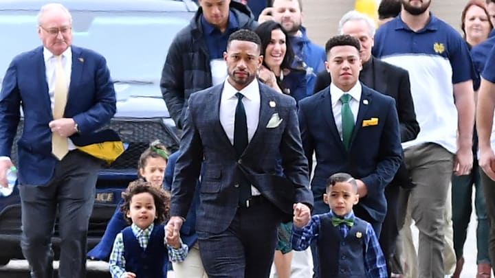 Dec 6, 2021; Notre Dame, IN, USA; Notre Dame Fighting Irish head football coach Marcus Freeman enters the Irish Athletics Center with his family for his formal introduction on the campus of the University of Notre Dame.
