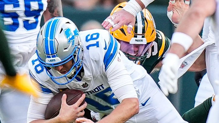 Lions quarterback Jared Goff is sacked by Green Bay Packers defensive ends Lukas Van Ness (90) and Rashan Gary (not pictured). Lions quarterback Jared Goff is sacked by Green Bay Packers defensive ends Lukas Van Ness (90) and Rashan Gary (not pictured).