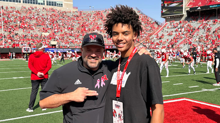 2027 four-star quarterback Trae Taylor (right) with Nebraska football coach Matt Rhule (left) after the Rutgers game.