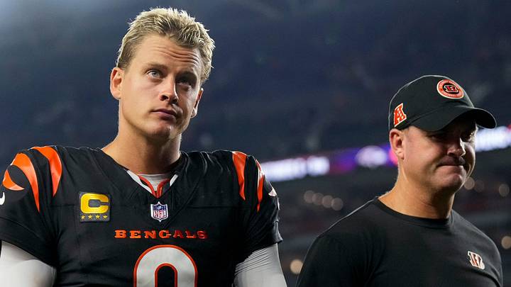 Cincinnati Bengals quarterback Joe Burrow (9) and head coach Zac Taylor head for the locker room after the fourth quarter of the NFL Week 3 game between the Cincinnati Bengals and the Washington Commanders at Paycor Stadium in downtown Cincinnati on Monday, Sept. 23, 2024. The Bengals remain winless after a 38-33 loss to Washington.