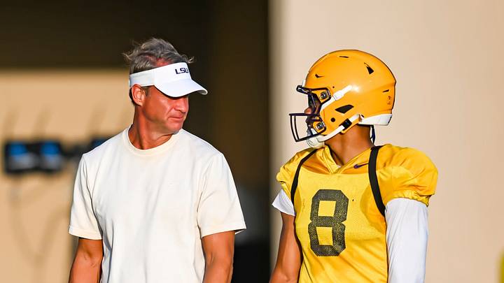 LSU Tigers head football coach Lane Kiffin talking with Quarterback Husan Longstreet 8 at LSU Football practice. August 18, 2026. LSU Tigers head football coach Lane Kiffin talking with Quarterback Husan Longstreet 8 at LSU Football practice. August 18, 2026.