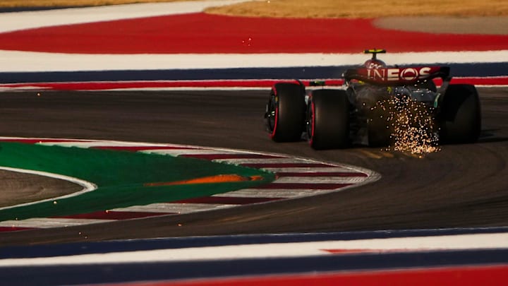 Mercedes-AMG Petronas driver Lewis Hamilton's car scrapes in turn four during qualifying at the Formula 1 Pirelli United States Grand Prix at Circuit of the Americas on Saturday, Oct. 19, 2024.