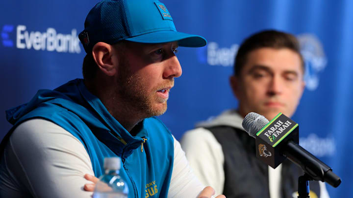 Jacksonville Jaguars head coach Liam Coen speaks during a press conference as general manager James Gladstone looks on at the Miller Electric Center, Wednesday, Jan. 14, 2026, in Jacksonville, Fla.