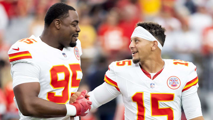 Aug 9, 2025; Glendale, Arizona, USA; Kansas City Chiefs defensive tackle Chris Jones (95) with quarterback Patrick Mahomes (15) against the Arizona Cardinals during a preseason NFL game at State Farm Stadium. Mandatory Credit: Mark J. Rebilas-Imagn Images