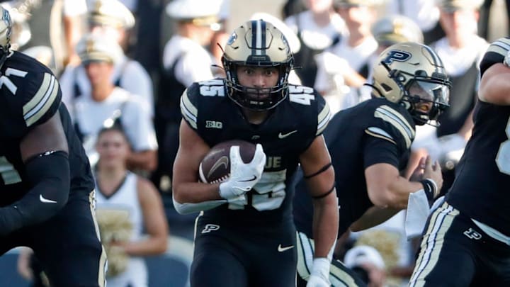 Purdue Boilermakers running back Devin Mockobee (45) runs with the ball 