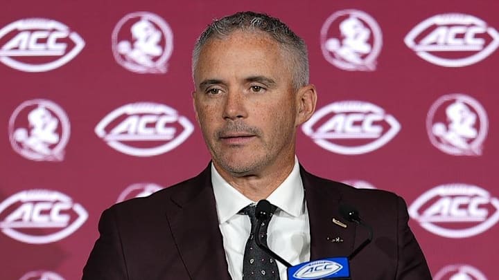 Jul 23, 2025; Charlotte, NC, USA; Florida State head coach Mike Norvell answers questions from the media during ACC Media days at Hilton Charlotte Uptown. Mandatory Credit: Jim Dedmon-Imagn Images