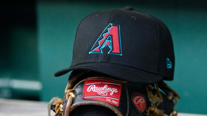 Apr 4, 2025; Washington, District of Columbia, USA; A detailed view of an Arizona Diamondbacks hat at the game between the Washington Nationals and the Arizona Diamondbacks at Nationals Park. Mandatory Credit: Reggie Hildred-Imagn Images Apr 4, 2025; Washington, District of Columbia, USA; A detailed view of an Arizona Diamondbacks hat at the game between the Washington Nationals and the Arizona Diamondbacks at Nationals Park. Mandatory Credit: Reggie Hildred-Imagn Images