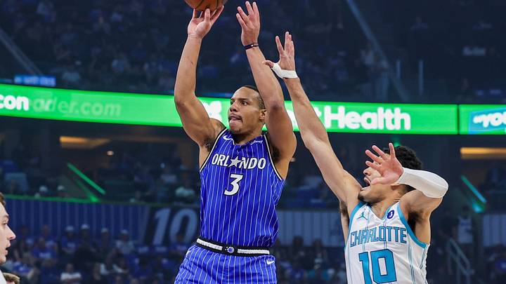 Apr 17, 2026; Orlando, Florida, USA; Orlando Magic guard Desmond Bane (3) shoots in front of Charlotte Hornets guard Josh Green (10) during the second quarter during the play-in rounds of the 2026 NBA Playoffs at Kia Center. Mandatory Credit: Mike Watters-Imagn Images Apr 17, 2026; Orlando, Florida, USA; Orlando Magic guard Desmond Bane (3) shoots in front of Charlotte Hornets guard Josh Green (10) during the second quarter during the play-in rounds of the 2026 NBA Playoffs at Kia Center. Mandatory Credit: Mike Watters-Imagn Images