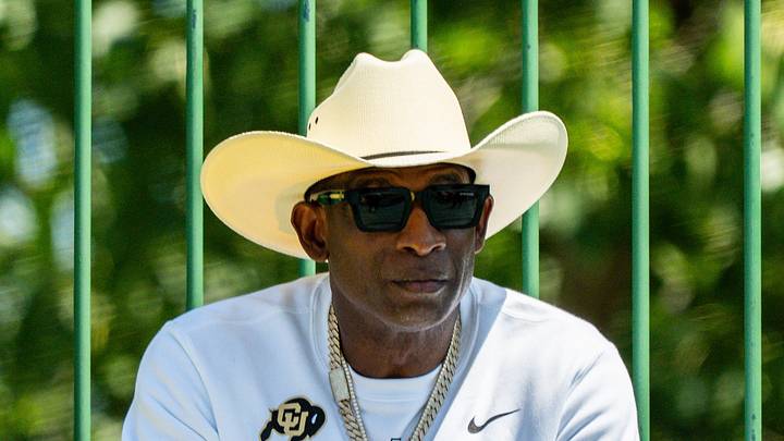 Deion Sanders takes in the second day of Cleveland Browns training camp, July 30, 2026, in Berea, Ohio. Deion Sanders takes in the second day of Cleveland Browns training camp, July 30, 2026, in Berea, Ohio.