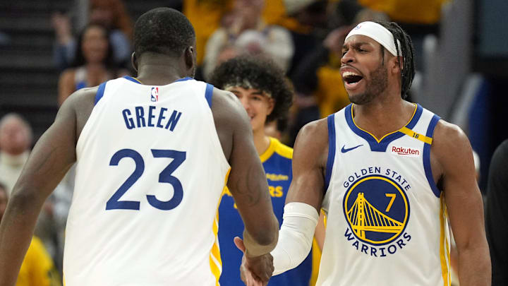 Apr 26, 2025; San Francisco, California, USA; Golden State Warriors guard Buddy Hield (7) congratulates forward Draymond Green (23) during the fourth quarter of game three of first round for the 2024 NBA Playoffs against the Houston Rockets at Chase Center. Mandatory Credit: Darren Yamashita-Imagn Images
