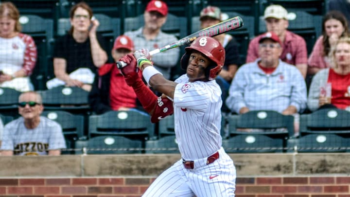 Oklahoma outfielder Jason Walk swings against Missouri.