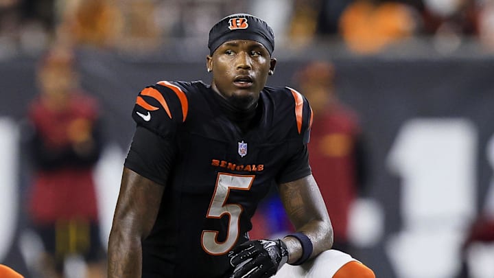 Sep 23, 2024; Cincinnati, Ohio, USA; Cincinnati Bengals wide receiver Tee Higgins (5) kneels during a stop in play in the first half against the Washington Commanders at Paycor Stadium. Mandatory Credit: Katie Stratman-Imagn Images