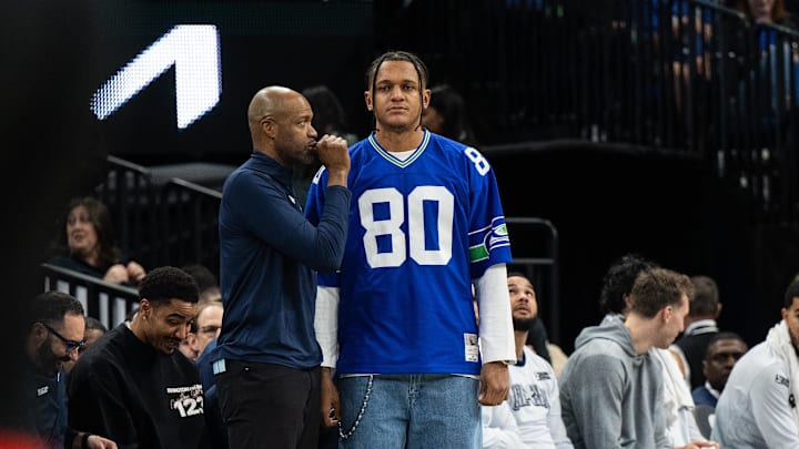 Dec 8, 2024; Orlando, Florida, USA; Orlando Magic head coach Jamahl Mosley and Orlando Magic forward Paolo Banchero (5) talk in the second quarter at Kia Center. Mandatory Credit: Jeremy Reper-Imagn Images Dec 8, 2024; Orlando, Florida, USA; Orlando Magic head coach Jamahl Mosley and Orlando Magic forward Paolo Banchero (5) talk in the second quarter at Kia Center. Mandatory Credit: Jeremy Reper-Imagn Images