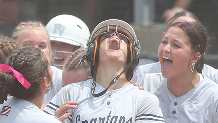 Pleasant Valley's Jessie Clemons (2) celebrates with team mates after hitting a three-run home run during the fifth inning in the class 5A state softball quarterfinal at Rogers Sports complex on Monday, July 22, 2024, in Fort Dodge, Iowa.