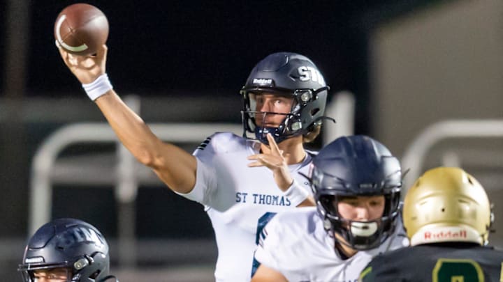 Cole Bergeron throws a pass for St. Thomas More 