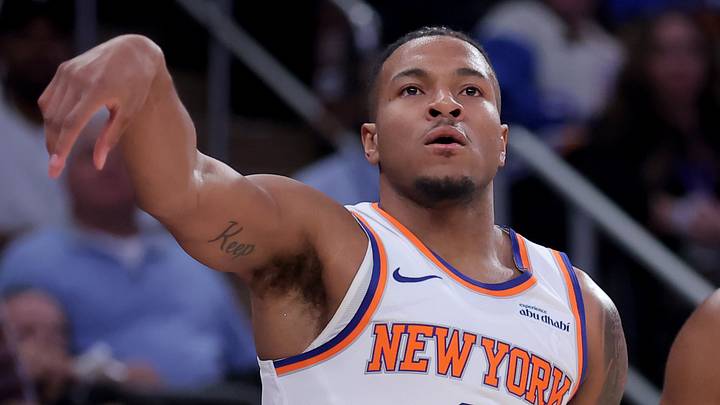 May 4, 2026; New York, New York, USA; New York Knicks guard Miles McBride (2) watches his three point shot against Philadelphia 76ers guard Tyrese Maxey (0) during the first quarter of game one of the eastern conference semifinal round of the 2026 NBA Playoffs at Madison Square Garden. Mandatory Credit: Brad Penner-Imagn Images