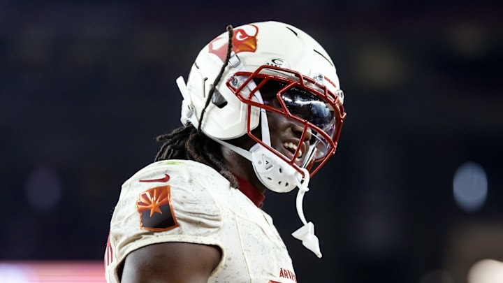 Sep 25, 2025; Glendale, Arizona, USA; Arizona Cardinals wide receiver Marvin Harrison Jr. (18) against the Seattle Seahawks at State Farm Stadium. Mandatory Credit: Mark J. Rebilas-Imagn Images