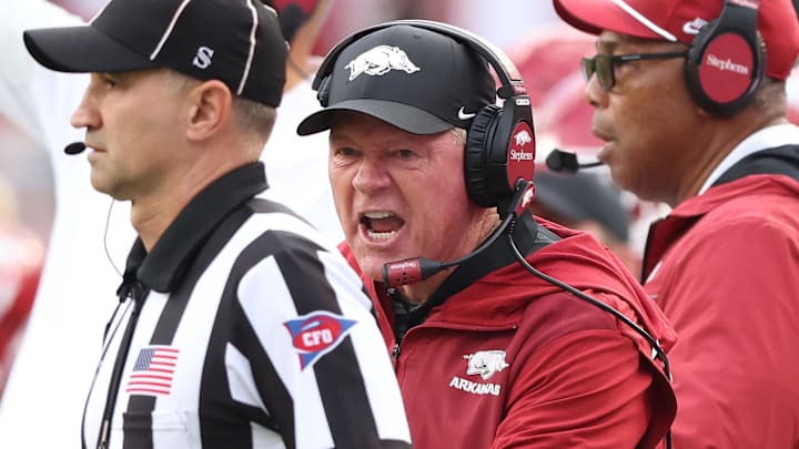 Arkansas Razorbacks interim head coach Bobby Petrino shouts toward a referee during the second quarter against the Texas A&M Aggies at Razorback Stadium.