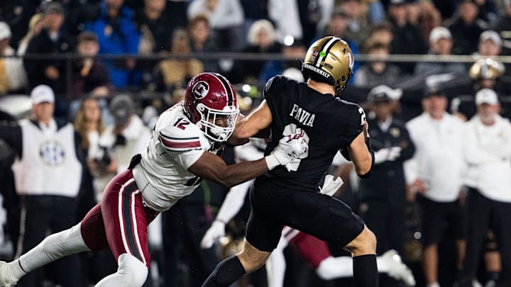 South Carolina Gamecocks edge Jatius Geer (12) goes to take down Vanderbilt Commodores quarterback Diego Pavia (2) during the second half of the game at FirstBank Stadium in Nashville, Tenn., Saturday, Nov. 9, 2024.