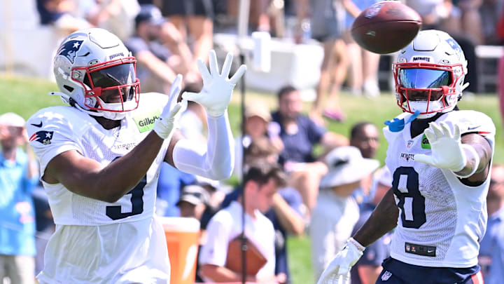 New England Patriots wide receiver Kayshon Boutte (9) does a drill with wide receiver Stefon Diggs (8) during training camp at Gillette Stadium.