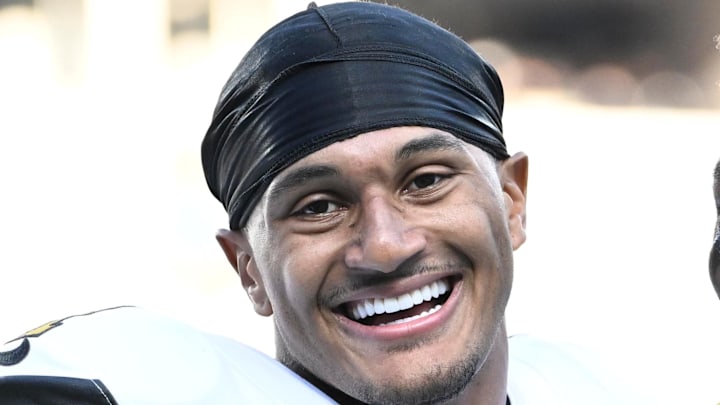Nov 9, 2025; Charlotte, North Carolina, USA; New Orleans Saints cornerback Alontae Taylor (1) and running back Devin Neal (24) react after the game at Bank of America Stadium. Mandatory Credit: Bob Donnan-Imagn Images Nov 9, 2025; Charlotte, North Carolina, USA; New Orleans Saints cornerback Alontae Taylor (1) and running back Devin Neal (24) react after the game at Bank of America Stadium. Mandatory Credit: Bob Donnan-Imagn Images