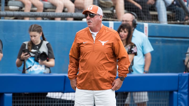 Texas Longhorns head coach Mike White look on in the sixth inning against the Florida Gators.