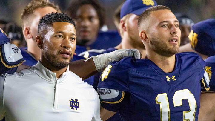 Sep 20, 2025; South Bend, Indiana, USA; Notre Dame Fighting Irish head coach Marcus Freeman and quarterback CJ Carr (13) sing the alma mater after beating the Purdue Boilermakers at Notre Dame Stadium. Sep 20, 2025; South Bend, Indiana, USA; Notre Dame Fighting Irish head coach Marcus Freeman and quarterback CJ Carr (13) sing the alma mater after beating the Purdue Boilermakers at Notre Dame Stadium.