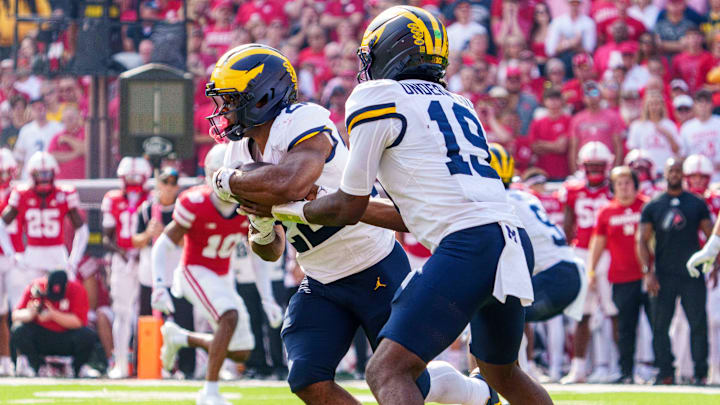 Michigan had alarming success running the ball for big gains, including this carry by Justice Haynes that went for a 75-yard touchdown late in the second quarter.