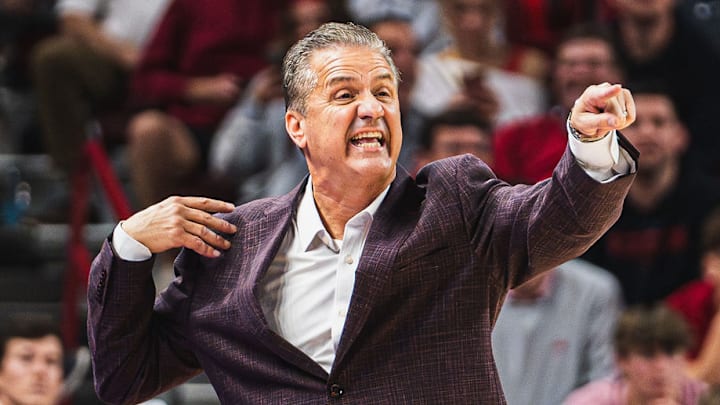 John Calipari points from the sideline in his first official game as Razorback head coach against Lipscomb. The Razorbacks won 76-60. John Calipari points from the sideline in his first official game as Razorback head coach against Lipscomb. The Razorbacks won 76-60.
