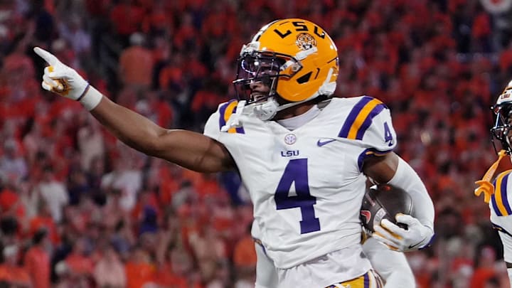 LSU Tigers cornerback Mansoor Delane celebrates with safety Tamarcus Cooley after a play against the Clemson Tigers 