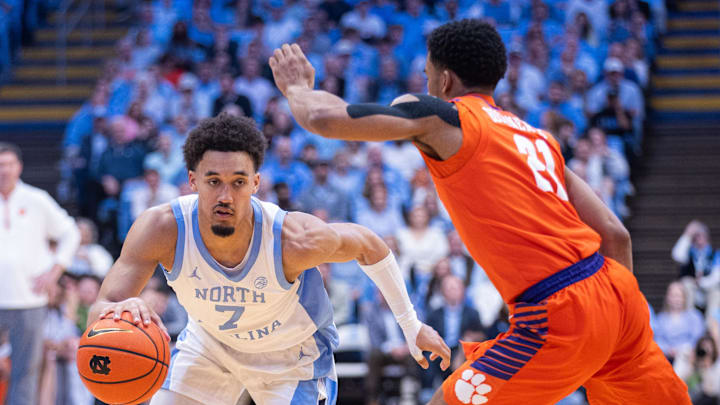 Mar 3, 2026; Chapel Hill, North Carolina, USA; North Carolina Tar Heels guard Seth Trimble (7) drives to the basket against Clemson Tigers guard Ace Buckner (21) second half at Dean E. Smith Center. Mandatory Credit: Scott Kinser-Imagn Images