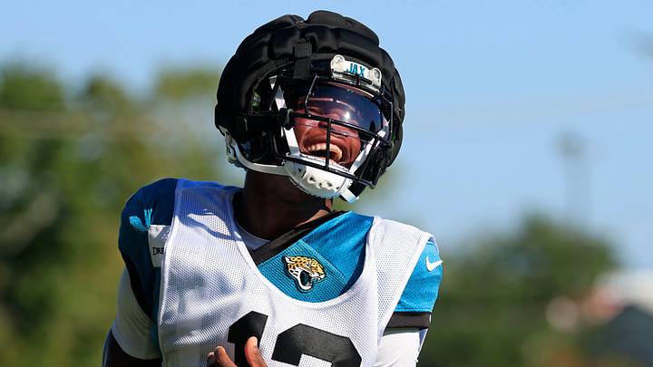 Jacksonville Jaguars wide receiver Travis Hunter (12) reacts during practices as cornerback Jarrian Jones (22) looks on during an NFL training camp session at the Miller Electric Center, Wednesday, Aug. 6, 2025, in Jacksonville, Fla. [Corey Perrine/Florida Times-Union]