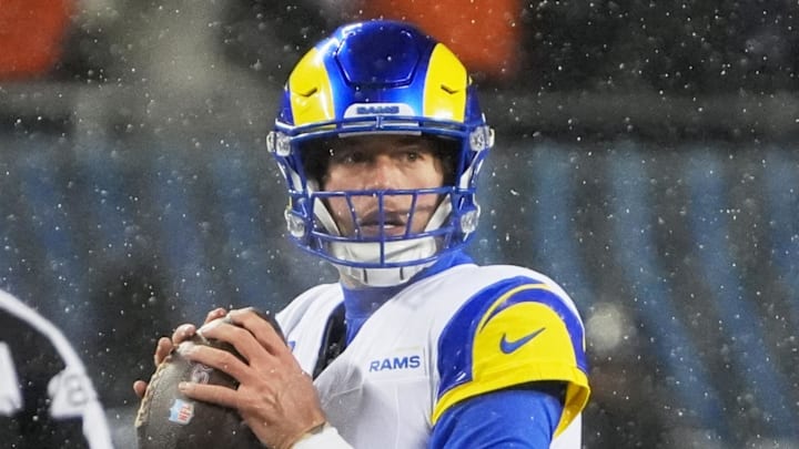 Jan 18, 2026; Chicago, IL, USA; Los Angeles Rams quarterback Matthew Stafford (9) looks to throw a pass against the Chicago Bears during the first quarter of an NFC Divisional Round game at Soldier Field. Mandatory Credit: David Banks-Imagn Images