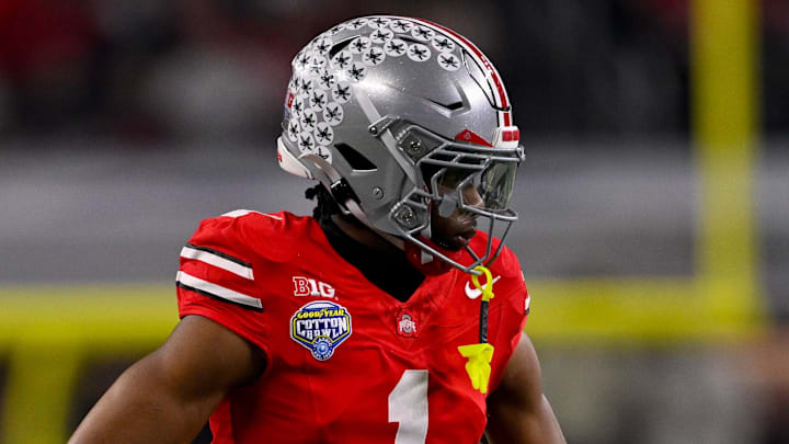 Dec 31, 2025; Arlington, TX, USA; Ohio State Buckeyes cornerback Davison Igbinosun (1) looks on during the 2025 Cotton Bowl and quarterfinal game of the College Football Playoff at AT&T Stadium. Mandatory Credit: Jerome Miron-Imagn Images