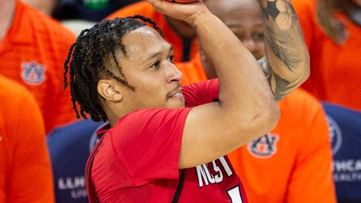 NC State Wolfpack forward Darrion Williams (1) takes a jump shot as the Auburn Tigers take on the NC State Wolfpack at Neville Arena in Auburn, Ala., on Wednesday, Dec. 3, 2025. Auburn Tigers lead NC State Wolfpack 41-35 at halftime.