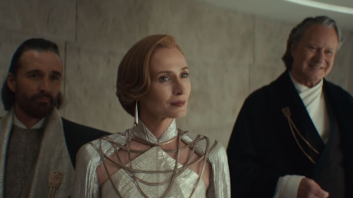 Star Wars (L-R) Perrin Fertha (Allistair Mackenzie), Mon Mothma (Genevieve O'Reilly) and Luthen Rael (Stellan Skarsgård) in Lucasfilm's ANDOR Season 2, exclusively on Disney+. Photo courtesy of Lucasfilm. ©2025 Lucasfilm Ltd. & TM. All Rights Reserved.