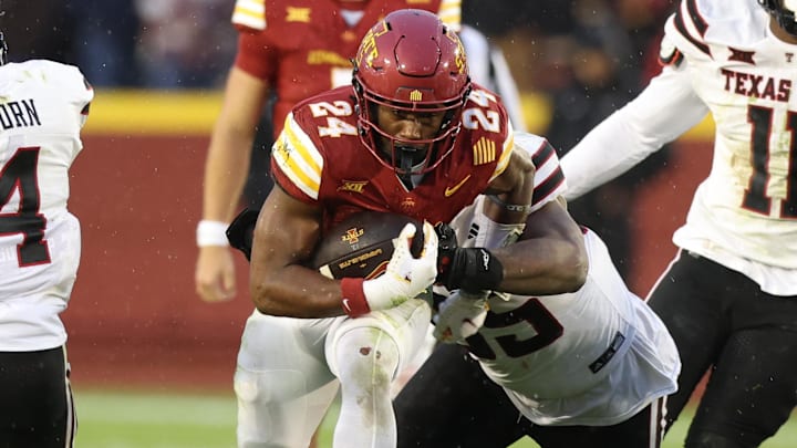 Nov 2, 2024; Ames, Iowa, USA; Iowa State Cyclones running back Abu Sama III (24) runs the football against the Texas Tech Red Raiders at Jack Trice Stadium. The Red Raiders won 23-22.  Mandatory Credit: Reese Strickland-Imagn Images