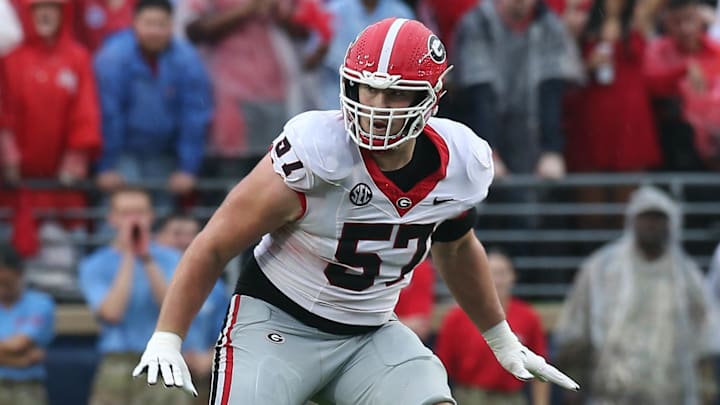 Nov 9, 2024; Oxford, Mississippi, USA; Georgia Bulldogs offensive lineman Monroe Freeling (57) blocks during the first half against the Mississippi Rebels at Vaught-Hemingway Stadium. Mandatory Credit: Petre Thomas-Imagn Images Nov 9, 2024; Oxford, Mississippi, USA; Georgia Bulldogs offensive lineman Monroe Freeling (57) blocks during the first half against the Mississippi Rebels at Vaught-Hemingway Stadium. Mandatory Credit: Petre Thomas-Imagn Images