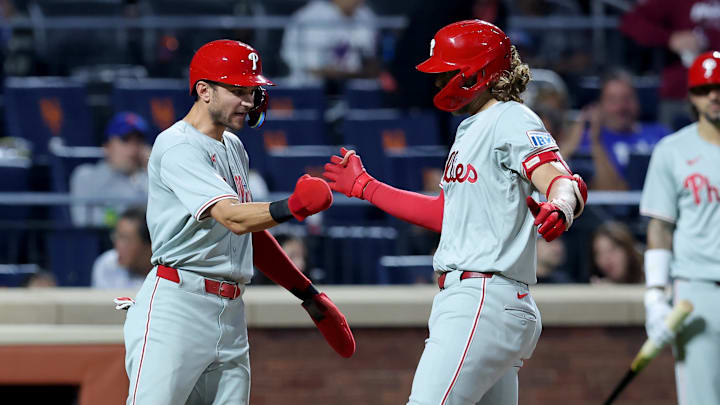 Sep 20, 2024; New York City, New York, USA; Philadelphia Phillies third baseman Alec Bohm (28) celebrates his three run home run against the New York Mets with shortstop Trea Turner (7) during the fourth inning at Citi Field. Mandatory Credit: Brad Penner-Imagn Images