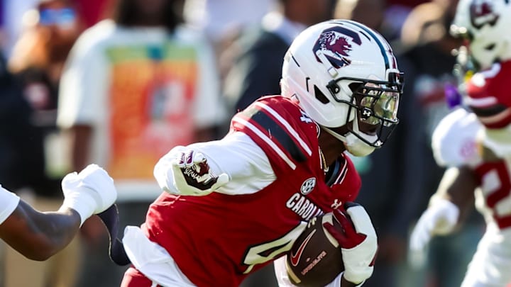 Oct 25, 2025; Columbia, South Carolina, USA; South Carolina Gamecocks wide receiver Vandrevius Jacobs returns a punt in the first quarter at Williams-Brice Stadium. Mandatory Credit: Jeff Blake-Imagn Images