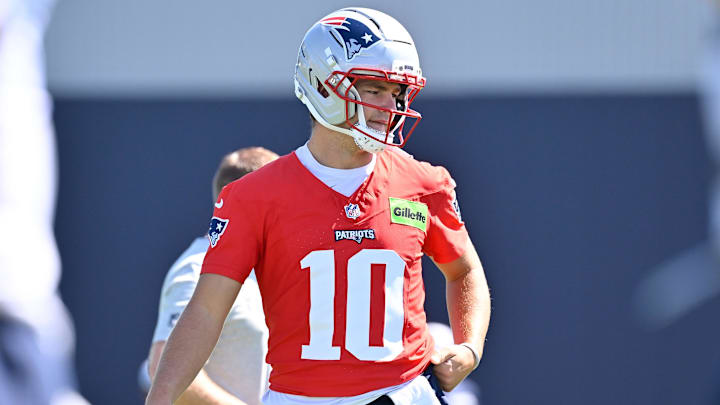 Jul 23, 2025; Foxborough, MA, USA; New England Patriots quarterback Drake Maye (10) warms up before drills at training camp at Gillette Stadium. Mandatory Credit: Eric Canha-Imagn Images