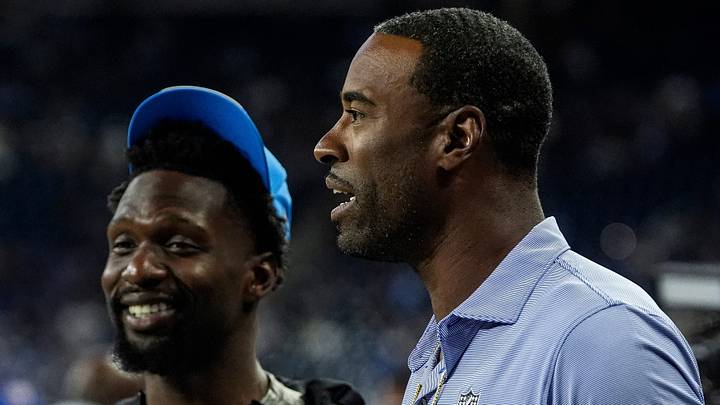 Calvin Johnson, right, talks to Detroit Lions safety Kerby Joseph, left, at warm up ahead of the New Orleans Saints game Calvin Johnson, right, talks to Detroit Lions safety Kerby Joseph, left, at warm up ahead of the New Orleans Saints game