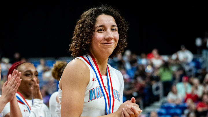 Lubbock Monterey guard Aaliyah Chavez celebrates the team's Division 2 State Championship victory.