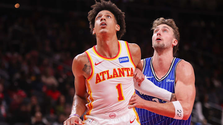 Nov 4, 2025; Atlanta, Georgia, USA; Atlanta Hawks forward Jalen Johnson (1) boxes out Orlando Magic forward Franz Wagner (22) in the second quarter at State Farm Arena. Mandatory Credit: Brett Davis-Imagn Images
