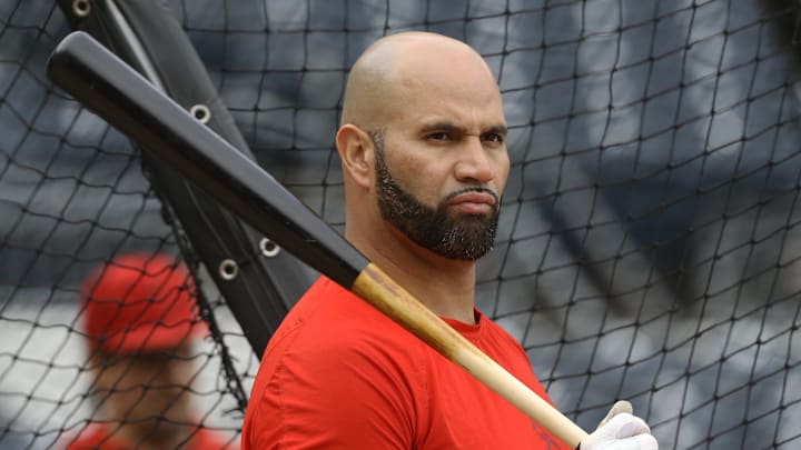 Oct 3, 2022; Pittsburgh, Pennsylvania, USA;  St. Louis Cardinals designated hitter Albert Pujols (5) at the batting cage before the game against the Pittsburgh Pirates at PNC Park. Mandatory Credit: Charles LeClaire-Imagn Images