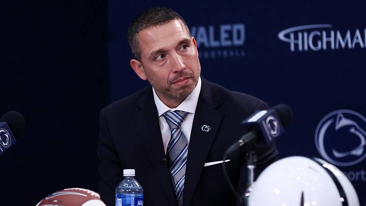 Dec 8, 2025; University Park, PA, USA; Matt Campbell, left, listens to Penn State University president Neeli Bendapudi speak as he is announced as the Penn State Nittany Lions new head coach during a press conference at the Beaver Stadium Press Room. Mandatory Credit: Matthew O'Haren-Imagn Images Dec 8, 2025; University Park, PA, USA; Matt Campbell, left, listens to Penn State University president Neeli Bendapudi speak as he is announced as the Penn State Nittany Lions new head coach during a press conference at the Beaver Stadium Press Room. Mandatory Credit: Matthew O'Haren-Imagn Images