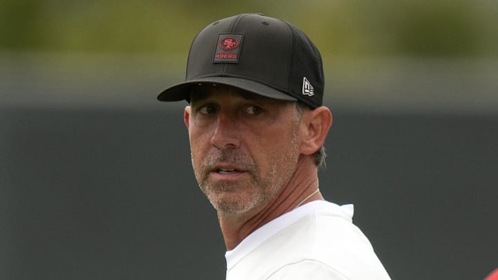 Jul 24, 2025; Santa Clara, CA, USA; San Francisco 49ers head coach Kyle Shanahan confers with a fellow staffer during the second day of training camp. Mandatory Credit: D. Ross Cameron-Imagn Images Jul 24, 2025; Santa Clara, CA, USA; San Francisco 49ers head coach Kyle Shanahan confers with a fellow staffer during the second day of training camp. Mandatory Credit: D. Ross Cameron-Imagn Images